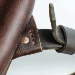 Tan Kodiak Leather Roll Top Backpack 9 Tan Kodiak Leather Roll Top Backpack -Home And Daily Necessities Store 800x800 Tan Kodiak Leather roll top backpack strap close up 600x600 1