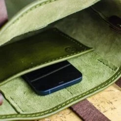 Olive Green Italian Leather Handbag -Home And Daily Necessities Store olive green leather handbag inside with phone 600x600 1